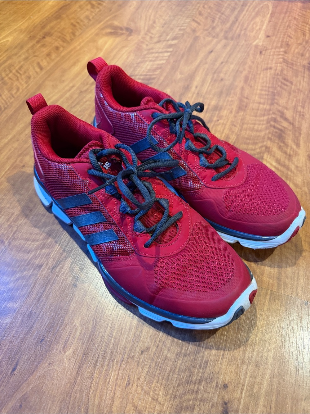Men’s adidas red Sneakers with Black Stripes